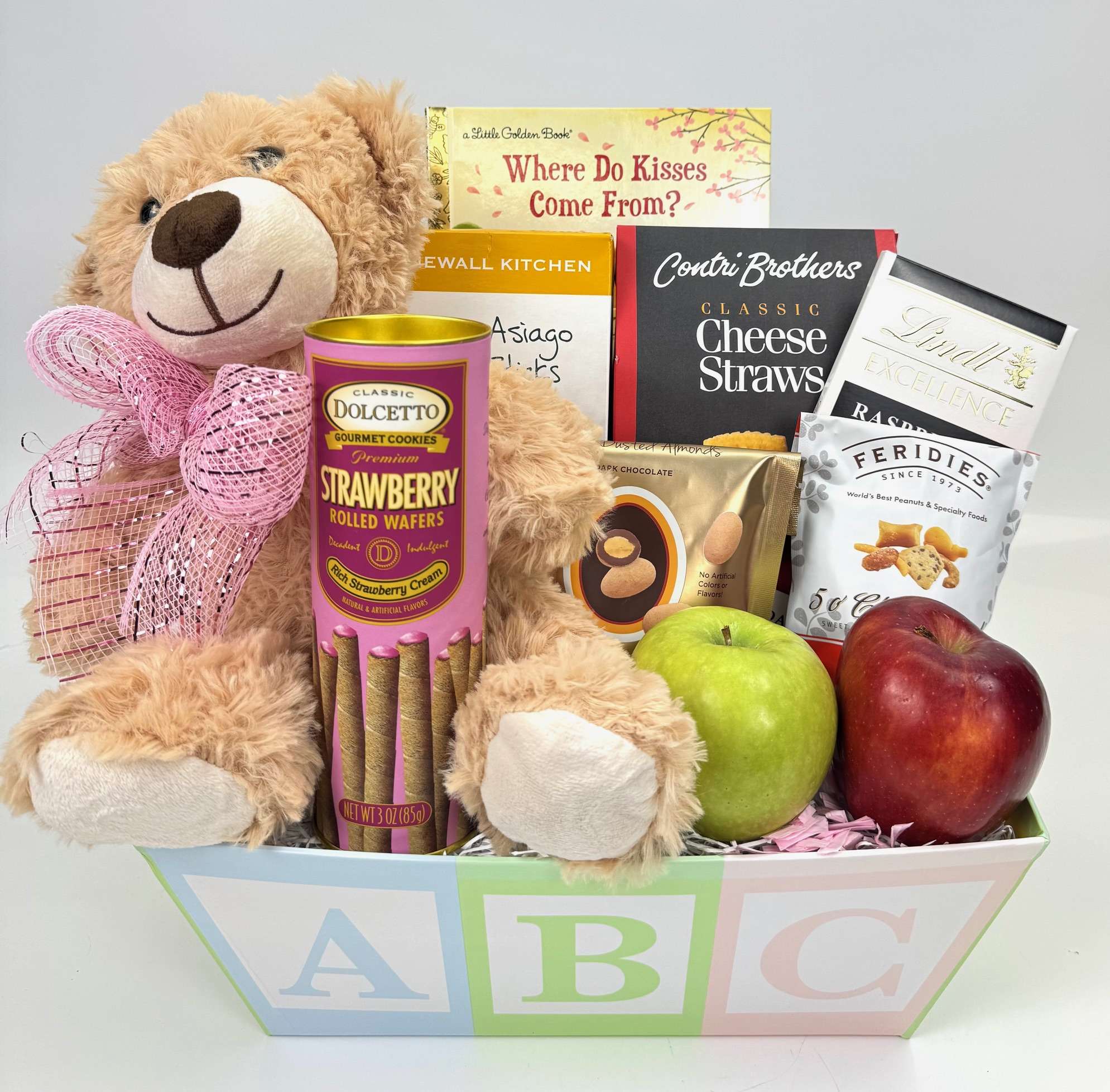 Bundles of Joy Baby Basket Baby gift basket with teddy bear, snacks, and fresh fruit.