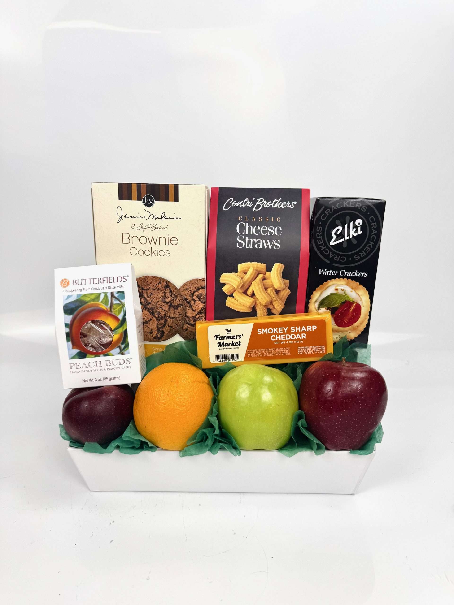 Contriโs Most Popular Gift Basket Fruit and snack basket with cheese, crackers, and brownies.
